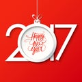 2017 Happy New Year greeting card with handwritten text design and christmas ball. Royalty Free Stock Photo