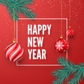 Happy New Year greeting card. Red Christmas balls hanging on fir branch and greeting text in white frame Royalty Free Stock Photo