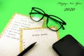 Happy New Year 2020 greeting card template with text. plan concept on green background Royalty Free Stock Photo