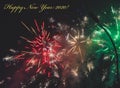 Happy New Year 2020 greeting card with yellow text and colorful firework on background Royalty Free Stock Photo