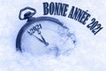 Happy New Year 2021 greeting in French language, bonne annee text, pocket watch Royalty Free Stock Photo