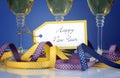 Happy New Year greeting tag with three champagne glasses