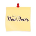 Happy New Year hand written on yellow sticky note attached with red pin. Realistic sticker and pushpin isolated on white. Holidays Royalty Free Stock Photo