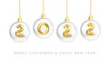 Happy New Year 2022. Hanging Transparent Glass Christmas Balls with Gold Numbers 2022 inside. X-mas decoration isolation on white Royalty Free Stock Photo