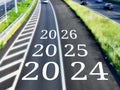 Happy New Year 2024, 2025, 2026 On Highway Road.