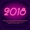 2018 Happy New Year Holiday. Bright Neon Alphabet Letters, Numbers and Symbols Sign in Vector. Royalty Free Stock Photo