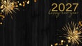 2027 Happy New Year holiday Greeting Card banner background - Golden firework fireworks pyrotechnics and bokeh lights on black