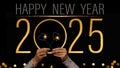 2025 Happy New Year holiday Greeting Card banner background - Young woman holds sparklers in her hands, golden year with text on