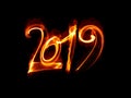 Happy new year 2019 isolated numbers lettering written with white fire flame or smoke on black background Royalty Free Stock Photo