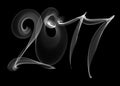 Happy new year 2017 isolated numbers lettering written with white fire flame or smoke on black background Royalty Free Stock Photo