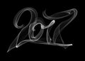 Happy new year 2017 isolated numbers lettering written with white fire flame or smoke on black background Royalty Free Stock Photo