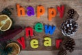 Happy New Year Magnet Letters Concept on wooden background