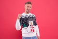 Happy new year. merry christmas. cheerful unshaven man in funny knitted sweater. man celebrate xmas party. winter Royalty Free Stock Photo