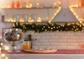 Happy New Year and Merry Christmas! Christmas kitchen. Wooden table with gingerbread, honey, shiksha. Beautiful bokeh in the