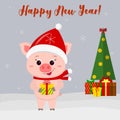 Happy New Year and Merry Christmas Greeting Card. Cute little pig in a santa hat and scarf holding a gift. Christmas tree, gifts a Royalty Free Stock Photo