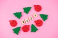 Happy New Year and Merry Christmas. Scrabble letters, playdough and plasticine. Letter tiles spelling celebration holiday