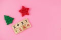 Happy New Year and Merry Christmas. Scrabble letters, playdough and plasticine. Letter tiles spelling celebration holiday