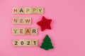 Happy New Year and Merry Christmas. Scrabble letters, playdough and plasticine. Letter tiles spelling celebration holiday