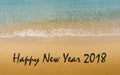 Happy New Year 2018 message written on idyllic tropical beach Royalty Free Stock Photo