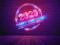 2020 happy new year with neon light alphabet on brick wall room background