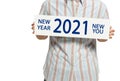 Happy New Year 2021. New year, new you, new goals. Conceptual motivational message written with blue paint. You can start to ch