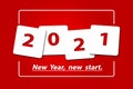 Happy New Year 2021. New year, new you, start, goals. Conceptual motivational message written with red numbers on white objects.