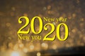 Happy New Year 2020. New year, new you, start, goals. Conceptual motivational message written with yellow paint. You can start to