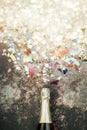 Happy New Year. New Years Eve celebration concept background.Champagne bottle with confetti Royalty Free Stock Photo