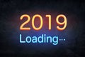 2019 happy new year number with neon lights backgrorund. Royalty Free Stock Photo