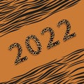 Happy New Year 2022 with Number 2022 on tiger print background.Creative trendy design for Greeting Lettering in yellow and black Royalty Free Stock Photo