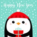 Happy New Year. Penguin bird head face holding gift box. Red hat. Merry Christmas. Cute cartoon kawaii baby character. Funny Royalty Free Stock Photo