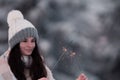 Happy new year,portrait of a happy beautiful brunette girl in the snow