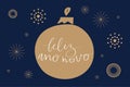 Happy New Year in portuguese Feliz Ano Novo handwritten lettering calligraphy. Golden decoration ball, fieworks