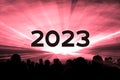 Happy new year 2023 red laser show party people crowd Royalty Free Stock Photo