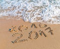 Happy New Year 2017 replace 2016 concept on the sea beach Royalty Free Stock Photo