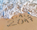 Happy New Year 2017 replace 2016 concept on the sea beach Royalty Free Stock Photo