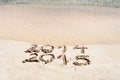 Happy New Year 2015 replace 2014 concept on the sea beach Royalty Free Stock Photo