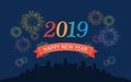 Happy new year 2019 in ribbons with colorful fireworks and round city skyline at night on dark blue color background Royalty Free Stock Photo