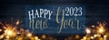 HAPPY NEW YEAR / NEW YEAR`S EVE 2023 background greeting card - Frame of lights bokeh golden flares and sparkler isolated on Royalty Free Stock Photo