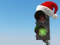 Happy new year 2018. Santa hat on the traffic light with green l Royalty Free Stock Photo