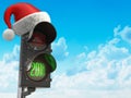 Happy new year 2018. Santa hat on the traffic light with green l Royalty Free Stock Photo