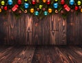 2017 Happy New Year seasonal background with real wood green pine, colorful Christmas baubles, gift boxe and other seasonal stuff Royalty Free Stock Photo