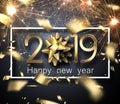 Happy New Year 2019 card with sparklers, bow and blurred golden