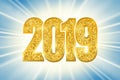 Happy New Year shiny gold number 2019. Golden glitter digits on sun rays bokeh background. Shiny glowing design, light Royalty Free Stock Photo