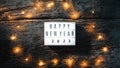 Happy New Year Sign on woodenBackground