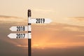 2019 happy new year- signpost, road signon sunset Sky And Clouds