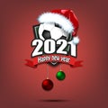 Happy new year 2021 and soccer ball in santa hat Royalty Free Stock Photo