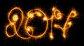 Happy New Year - 2017 with sparklers on black Royalty Free Stock Photo