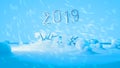 Happy new year 2019 swap 2018 broken isolated numbers lettering written by white stone or paper on blue background full Royalty Free Stock Photo