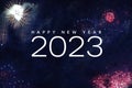 Happy New Year 2023 Text Holiday Celebration Graphic with Fireworks Background in Night Sky Royalty Free Stock Photo